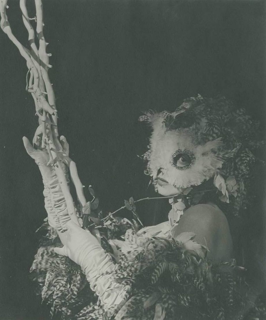 André Ostier :: Leonor Fini wearing a ball costume and the famous mask of a Snowy Owl, ca. 1949. | src stephen ellcock