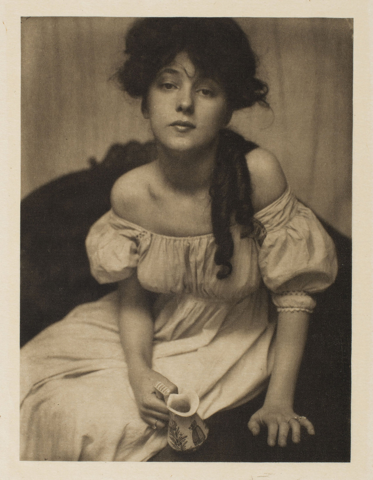 Gertrude Käsebier :: Portrait of Evelyn Nesbit (Miss N.). Published in Camera Work, Nº 1, 1903. Portrait of Evelyn Nesbit [three-quarter length portrait, seated, wearing an off-the-shoulder dress], 1902. The Toledo Museum of Art | src NYTimes Lens Journal