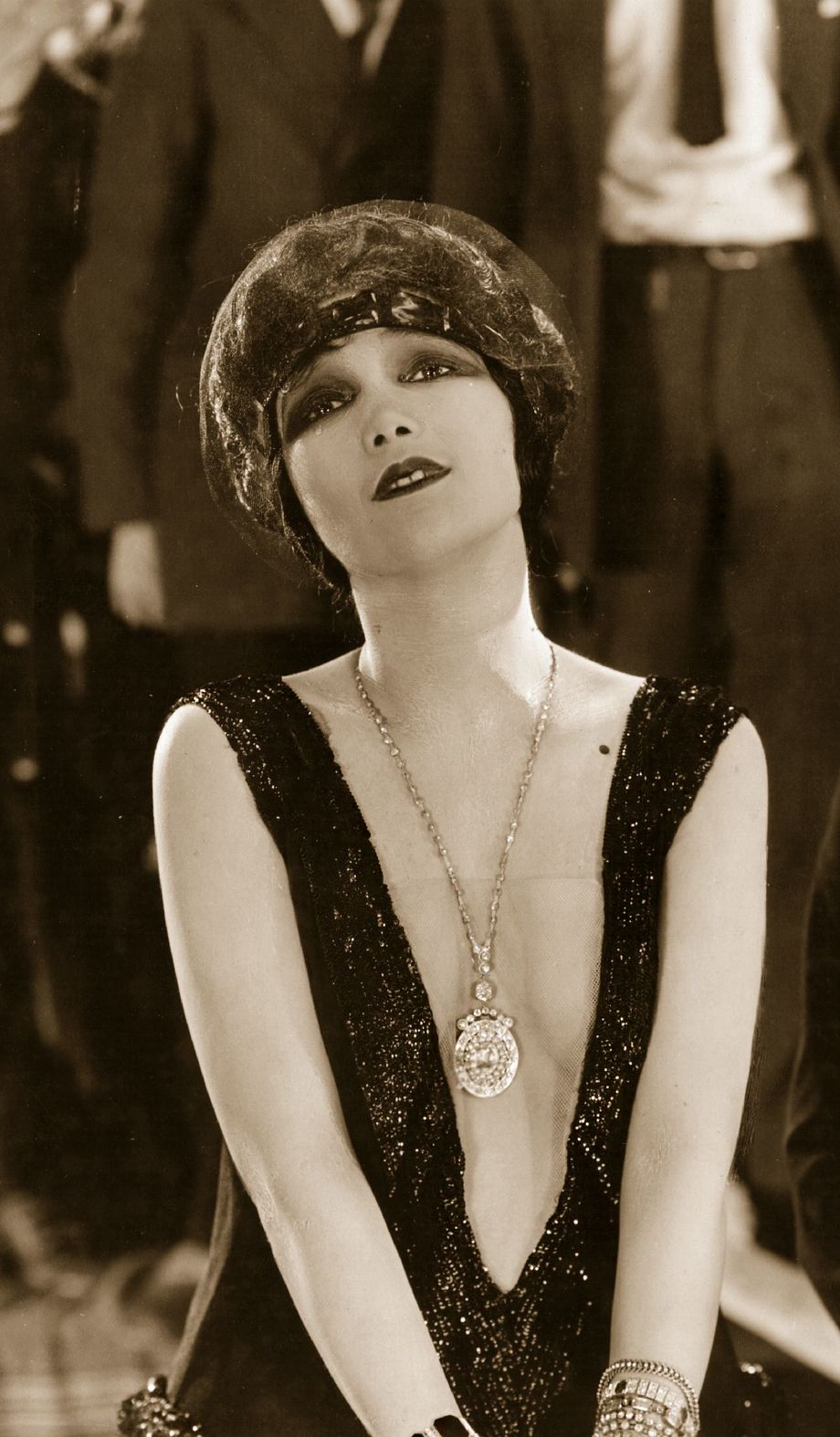 French actress Jetta Goudal (1898-1985) plays the unhappy wife of Adolphe Menjou in the silent comedy 'Open All Night' (aka 'One Parisian Night), directed by Paul Bern for Paramount (1924). Jetta is wearing a particularly revealing dress which exposes her cleavage down to her navel. | src Getty Images