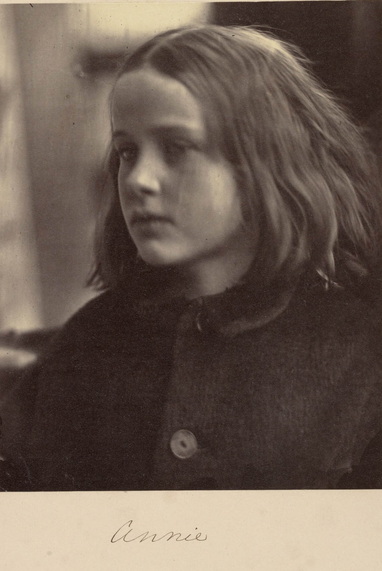 Annie; Julia Margaret Cameron (British, born India, 1815 - 1879); January 1864; Albumen silver print; 17.9 × 14.3 cm (7 1/16 × 5 5/8 in.); 84.XZ.186.69; No Copyright - United States (http://rightsstatements.org/vocab/NoC-US/1.0/)