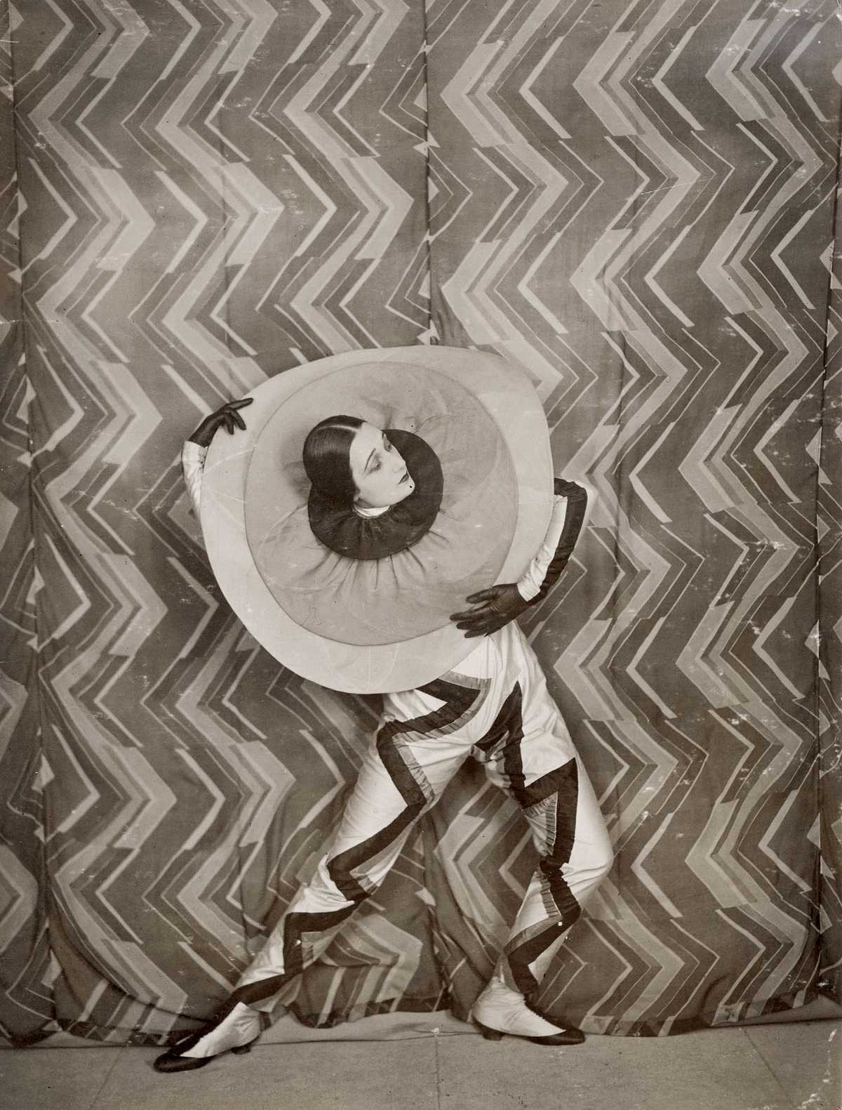Lizica Codreanu, wearing a Pierrot-Éclair costume designed by Sonia Delaunay, on the set of René Le Somptier’s film Le P’tit Parigot, 1926; unknown photographer. © Bibliothèque nationale de France. | src Tate Modern: The EY Exhibition: Sonia Delaunay