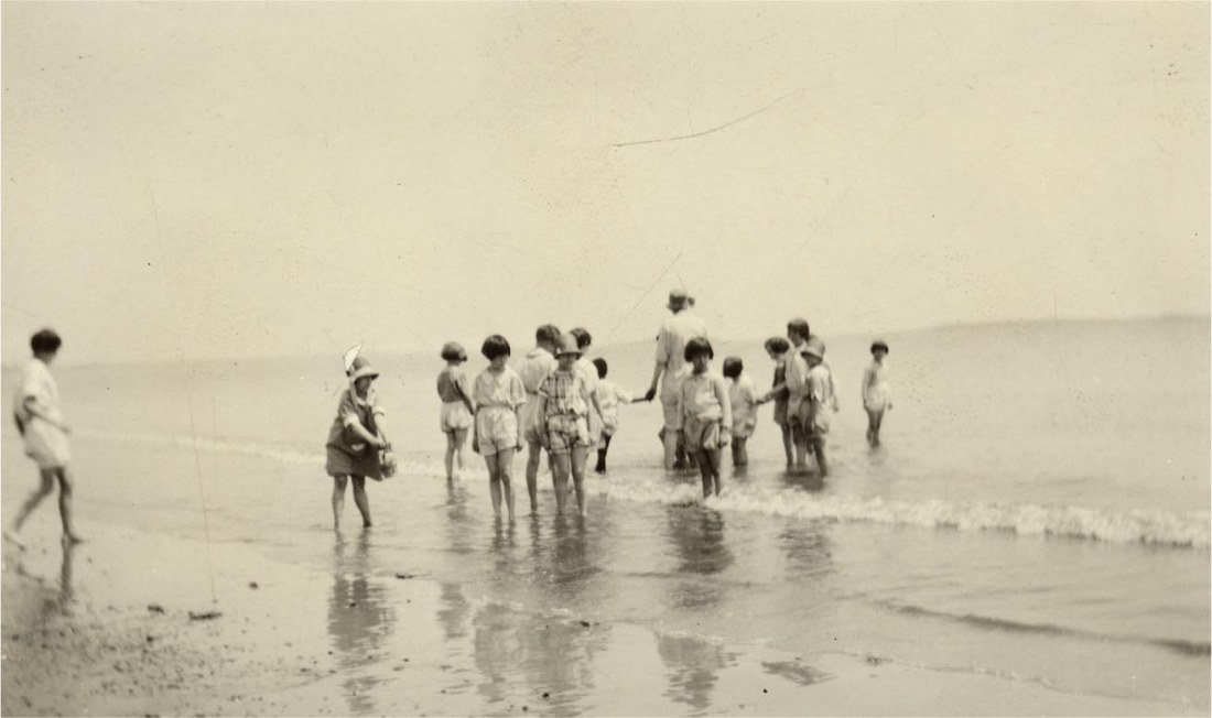 Perkins School for the Blind students in the water at Revere Beach on June 11th, 1928. bathers, beach scene