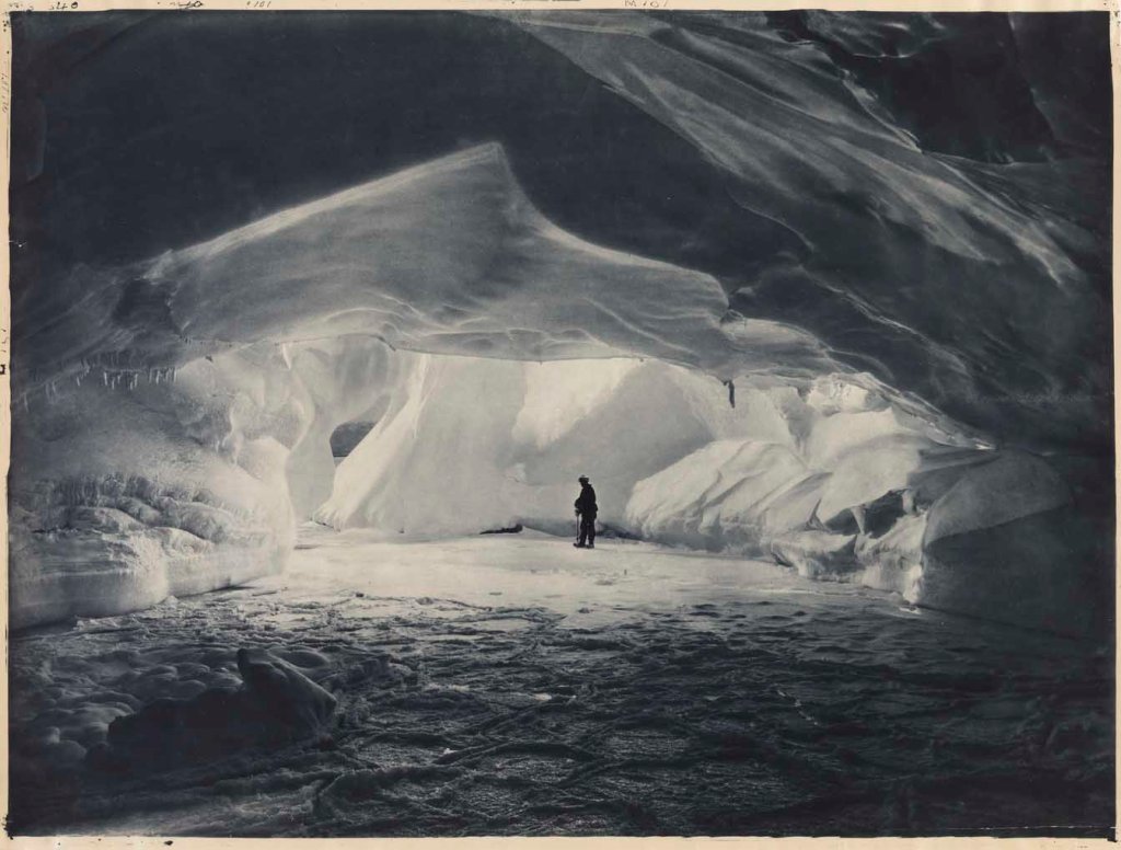 Frank Hurley :: Cavern carved by the sea in an ice wall near Commonwealth Bay. From: Antarctic views | src State Library of New South Wales website (low-res)
