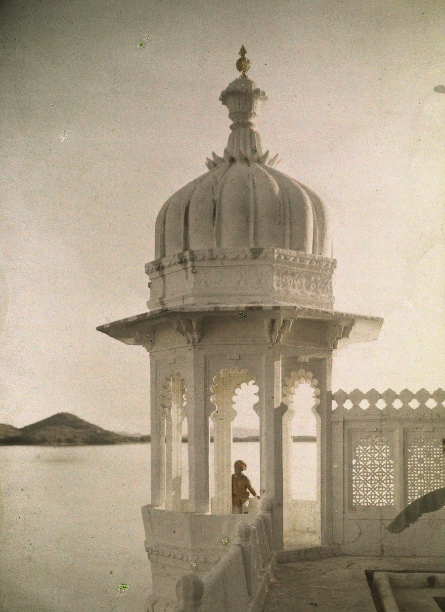 Jules Gervais Courtellemont :: View of the Palace of Maharaja’s pond from the Island of the Sultans in Udaipur, India, 1923. | src National Geographic