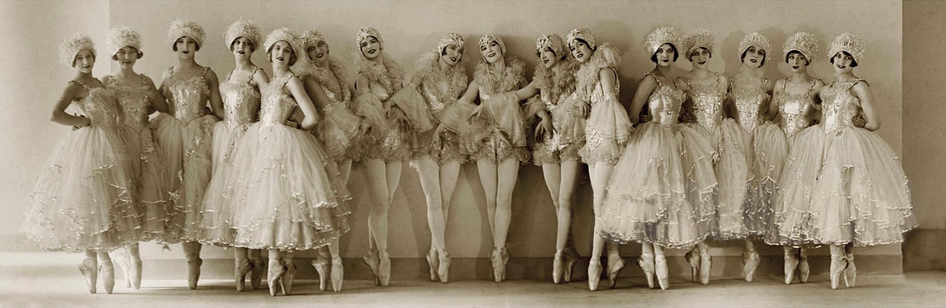 The Albertina Rasch Girls, sixteen ballet dancers, standing on point, wearing white ballet costumes, for the production of Rio Rita, at The New Ziegfeld Theater. Published in Vanity Fair, April 1927 (Photo by Florence Vandamm / Condé Nast / Getty Images)