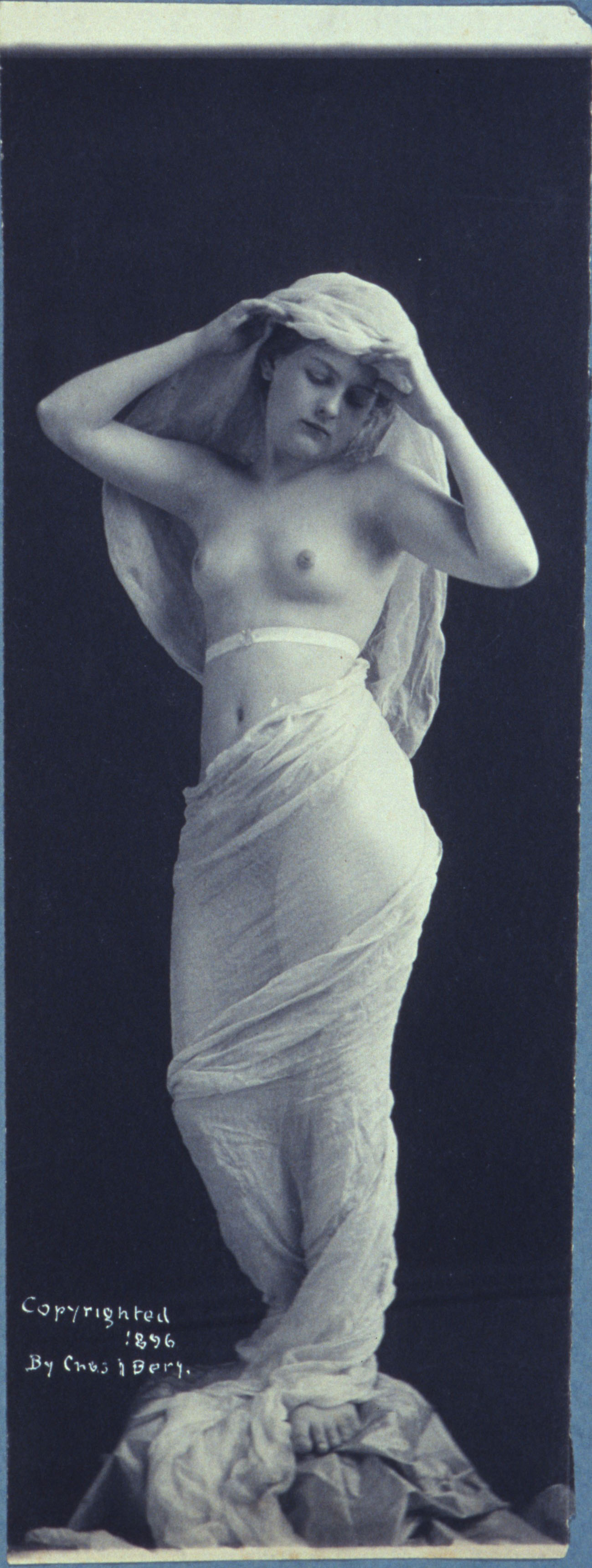 Charles I. Berg :: Night. A nude woman draped in gauzy fabric posing as if a statue. Copyrighted 1896 by Chas. I. Berg. Platinum print. | Library of Congress